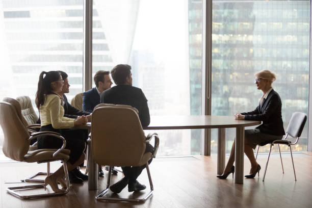 istock Confident mature applicant impress millennial recruiters at interview 1070080016
