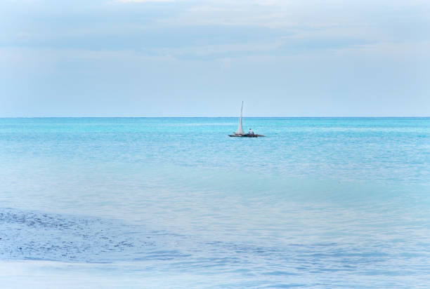 istock A lone siherman in his river raft 1070080832