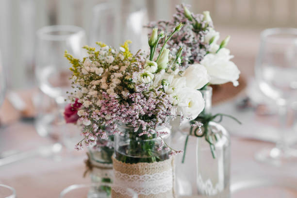istock flowers arrangement and decoration rustic interior design in wedding table detail 1070083982