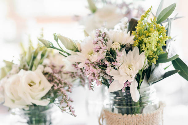 istock flowers arrangement and decoration rustic interior design in wedding table detail 1070084202
