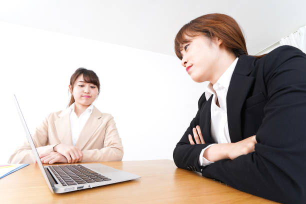 istock Two business woman talking 1070085130