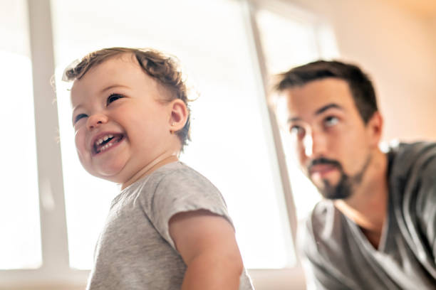 istock Happy young father playing with little daughter 1070086090