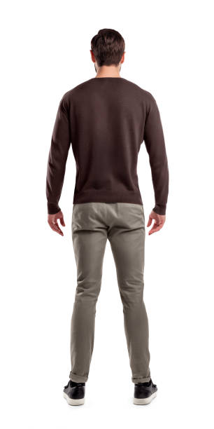 istock A back view on a modern fit and casually clothed man that stands in a relaxed posture completely straight. 1070093488