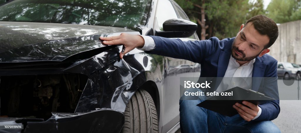 Inspecting Car Damage After A Crash Car, Crash, Examining, Expertise, Insurance Car Stock Photo