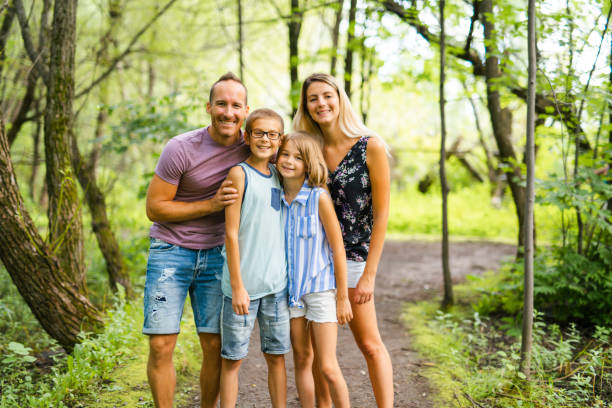 istock happy young family in forest having fun together 1070114408