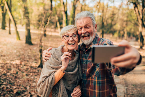 istock Smiling mature couple making a selfie 1070115076