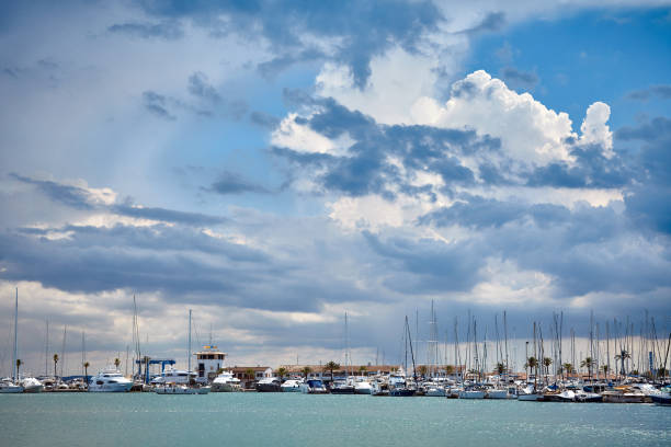 istock Stormy clouds over a marina. 1070117320