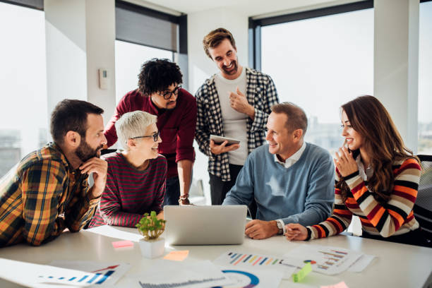 istock Business people using laptop and digital tablet 1070120734