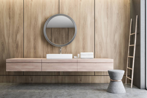 istock Sink and mirror in wooden bathroom 1070122548