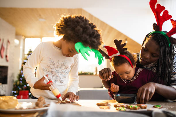 istock Family decorating Christmas cookies 1070126372