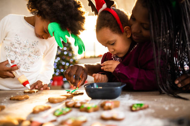 istock Family decorating Christmas cookies 1070126426