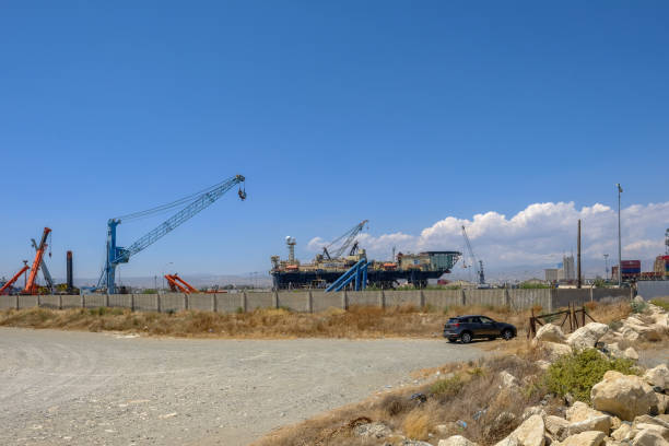 Limassol, Cyprus - June 23, 2018: Castoro Sei, a semi-submersible pipe laying vessel docked in Limassol at the port.  Shot taken on a bright blue sky afternoon.