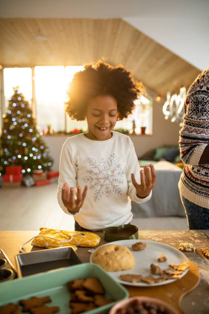 istock Girl enjoying making cookies 1070127296