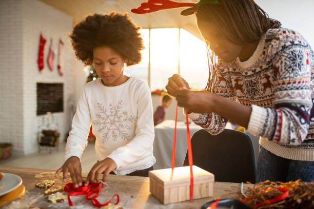 istock Wrapping Up Gingerbread Cookies In Gift 1070127516