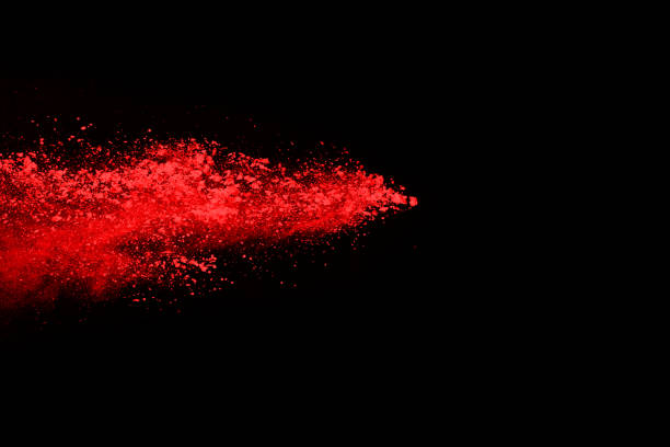 istock abstract red powder explosion on black background.abstract red powder splatted on black background. Freeze motion of red powder exploding. 1070133208