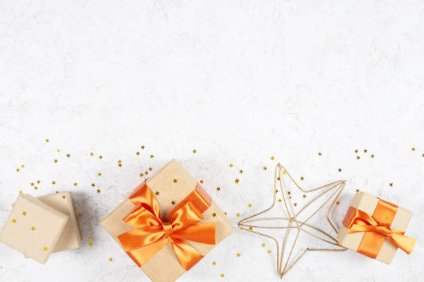 istock Background with craft gift boxes and golden stars 1070134564
