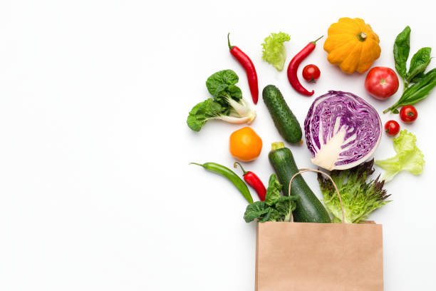 eco bolsa amigable con vegetales orgánicos - shopping bag white isolated blank fotografías e imágenes de stock