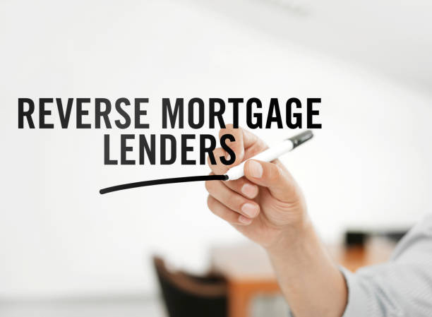 Reverse mortgage lenders Businessman writing "Reverse mortgage lenders” on a virtual board Reverse Mortgage stock pictures, royalty-free photos & images