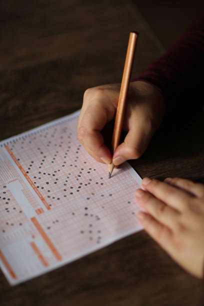 istock Child is marking optical form at the exam 1070139126