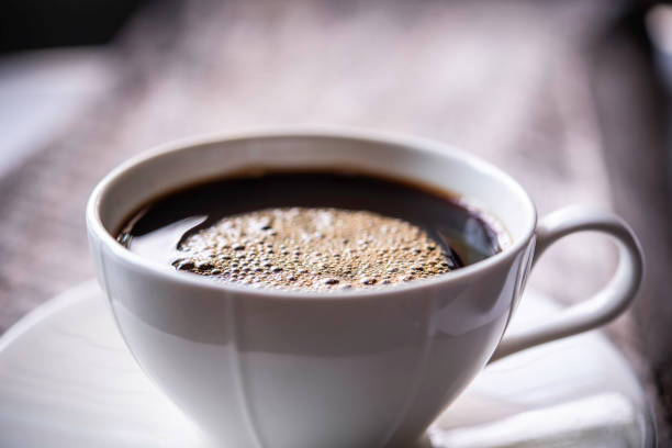 istock Coffee mug on wooden floor 1070142998