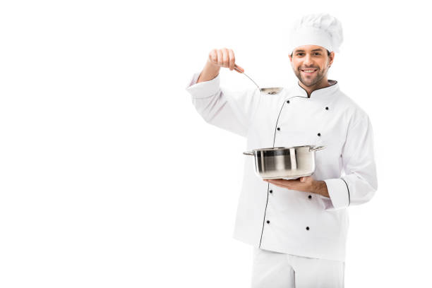 istock smiling young chef with cooking pot and ladle isolated on white 1070151448