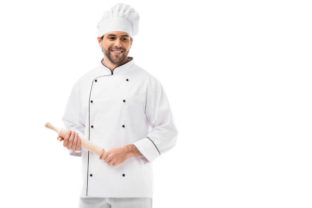 istock smiling young chef holding rolling pin isolated on white 1070153948