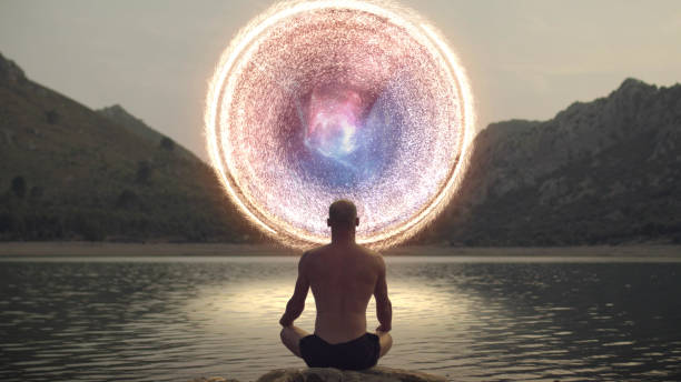 Meditating man opening portal to cosmic energy. Spiritual Awareness. Man opening portal to other galaxy. parallel photos stock pictures, royalty-free photos & images