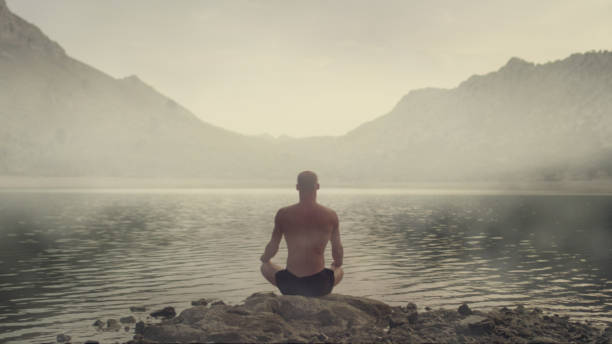 istock Meditating man in fog 1070156834