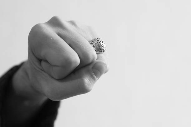 istock Male fist with a ring on his finger 1070157486