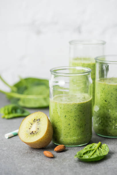 istock Green and fresh organic smoothie in glasses 1070160520