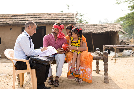 Indian family meeting financial advisor at village