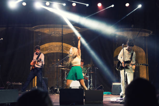 istock Rock band playing on the concert 1070171458