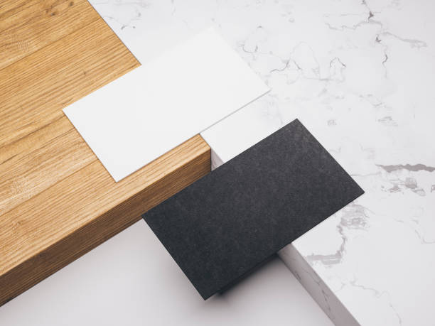 istock Minimalistic mockup with business cards on wood and warble texture.Creative mockup set. 1070174254