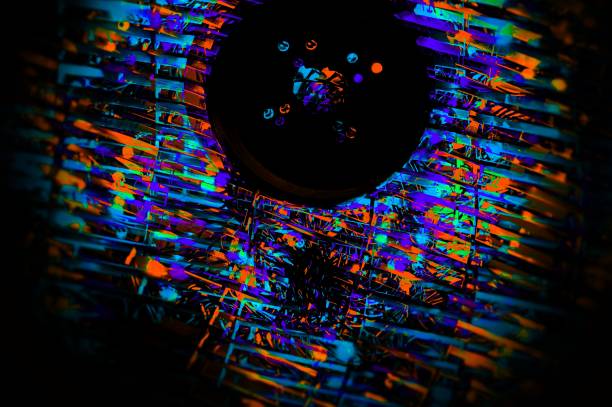 istock Electric magical wheel on a black background. Colorful glowing background. 1070182536