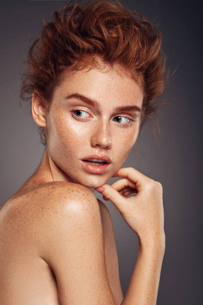 istock Beautiful redhead woman 1070185056