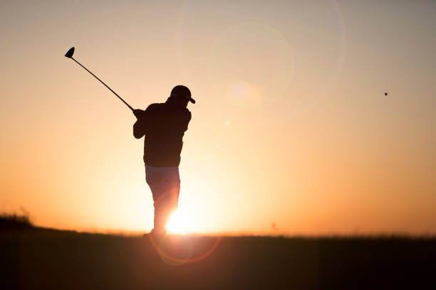istock Golf player shoting ball - Sunset Time -  Links Golf 1070191748