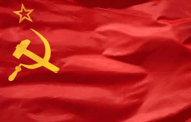 Flag ussr soviet union national state sign flag waving by wind natural colors angled perspective exterior detail photo close up background view patriotic theme scene