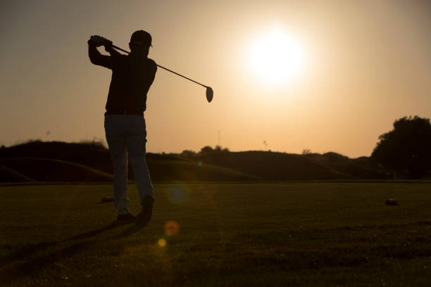 istock Golf player shoting ball - Sunset Time -  Links Golf 1070194368