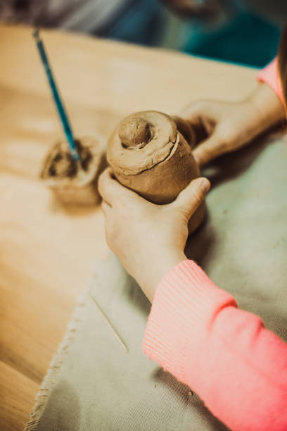 istock children's hands sculpts clay 1070194380