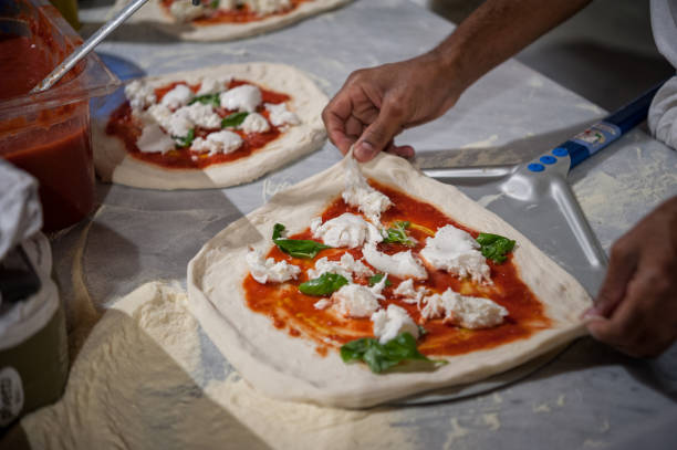 Preparing Pizza dought at the pizzeria.
