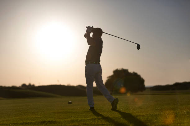 istock Golf player shoting ball - Sunset Time -  Links Golf 1070195178