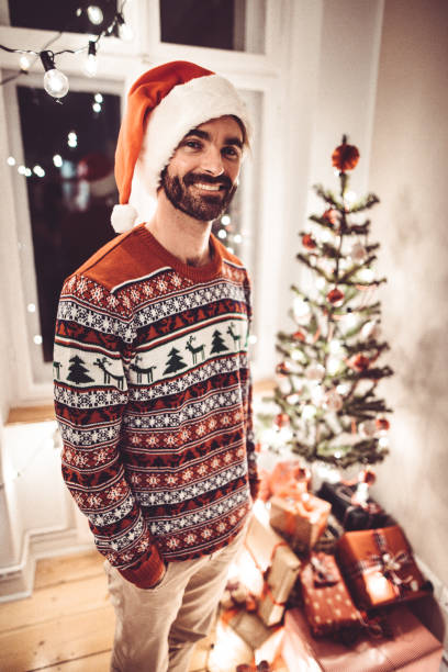 istock man standing at home for christmas 1070201000