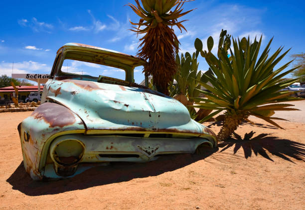 Abandoned vehicles sit in the desert outside Solitaire in Namibia. stock photo