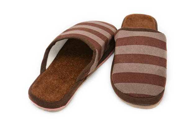 istock Slippers for home on an isolated background 1070209836