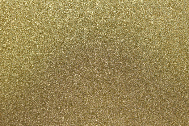 istock Sparkling macro glitter gold bokeh abstract background 1070215334