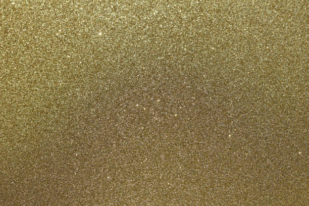 istock Sparkling macro glitter gold bokeh abstract background 1070225540