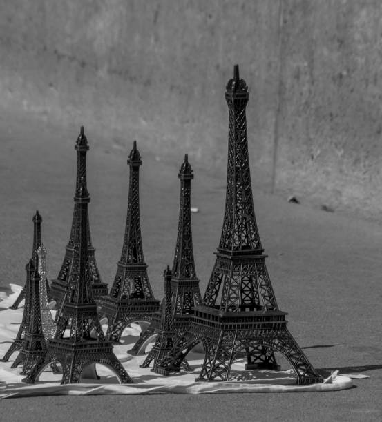 istock Eiffel tower for sale. Tourist souvenirs. 1070229332