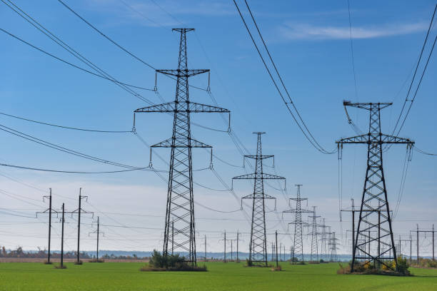 istock High-voltage power lines. Electricity distribution station. high voltage electric transmission tower. Distribution electric substation with power lines and transformers 1070230136