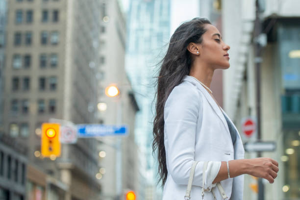 istock Business woman walking downtown 1070237208