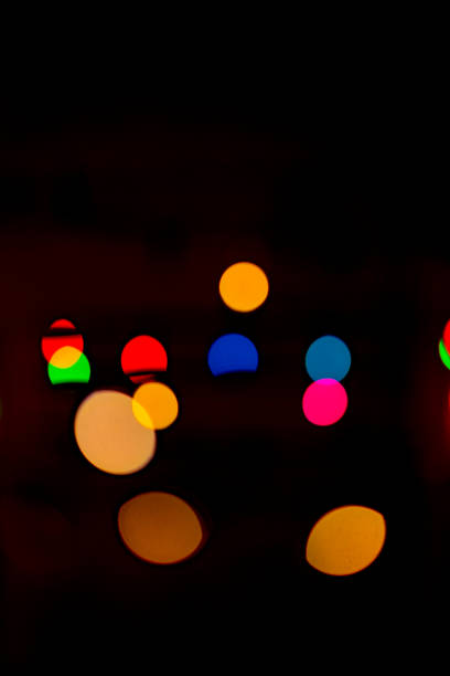 istock Colorful circles of light abstract background. 1070237526